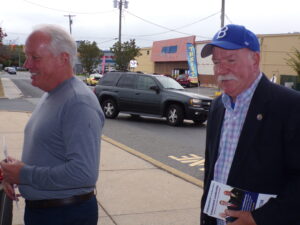 Milam, left, and Land hit the doors at ShopRite on Friday.