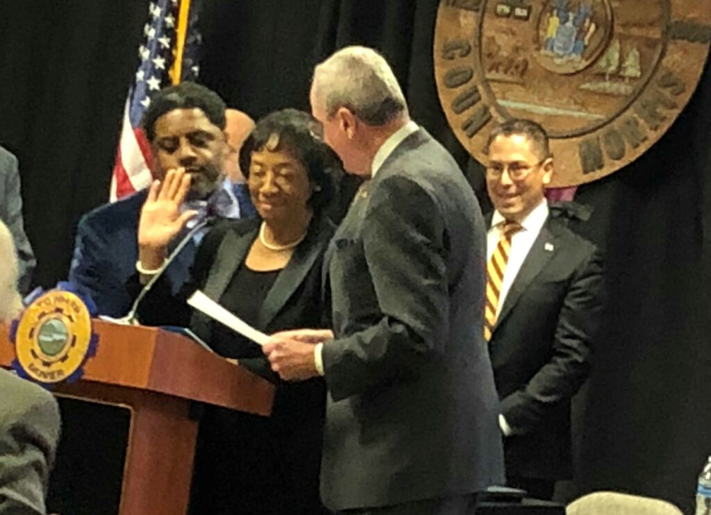 Murphy swears in Blackman in Dover.