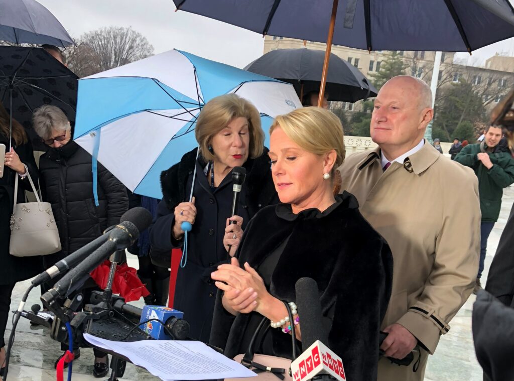 Kelly outside the Supreme Court.