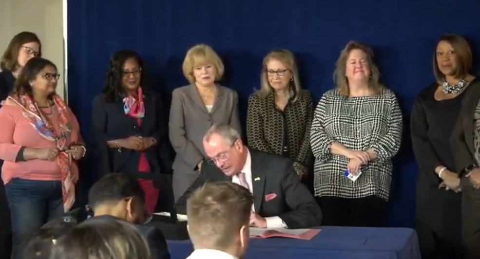 Governor Phil Murphy signs the bill.