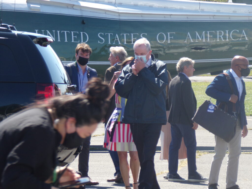 Governor Murphy prepares to board one of the transports en route to Manville.